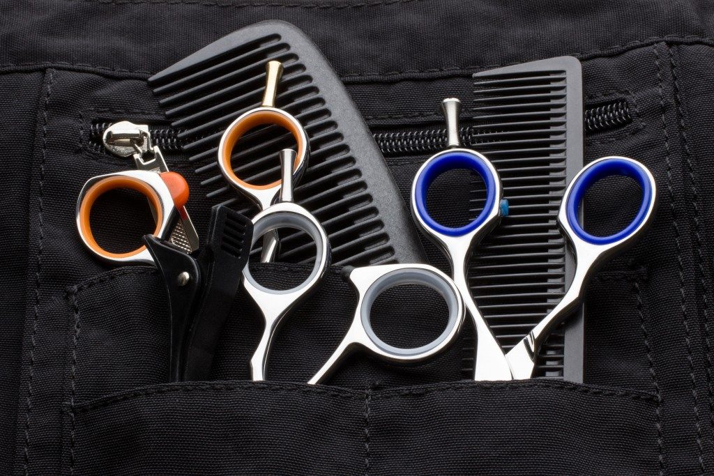 hairstylist's scissors and combs