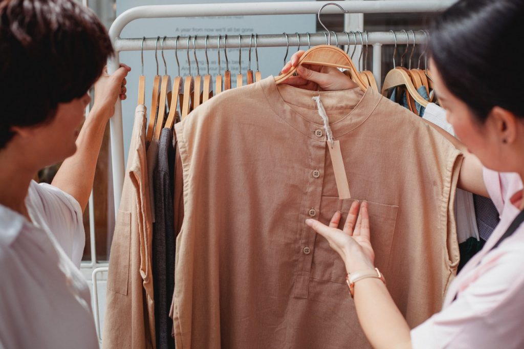 choosing a blouse to buy