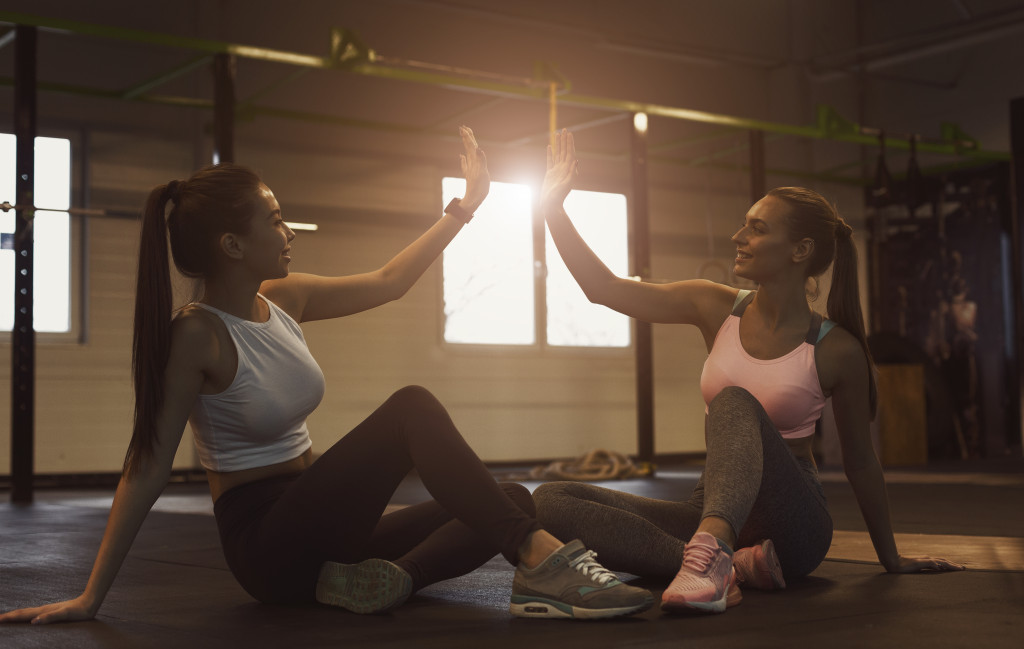two woman exercising