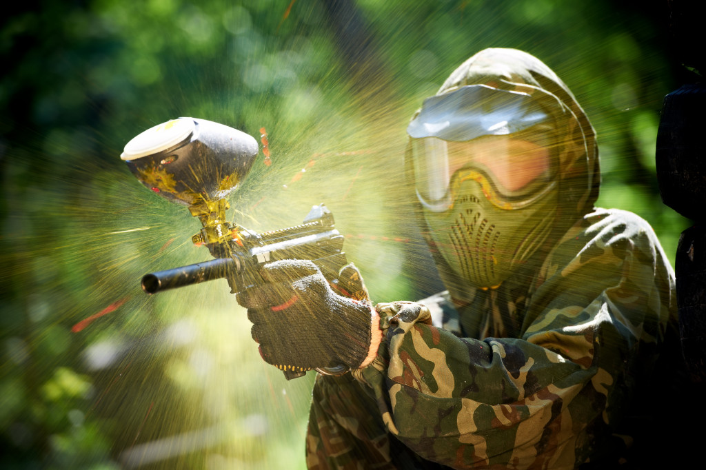 a person playing paintball